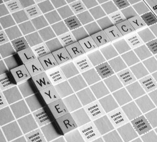 bankruptcy lawyer spelled out on a scrabble board